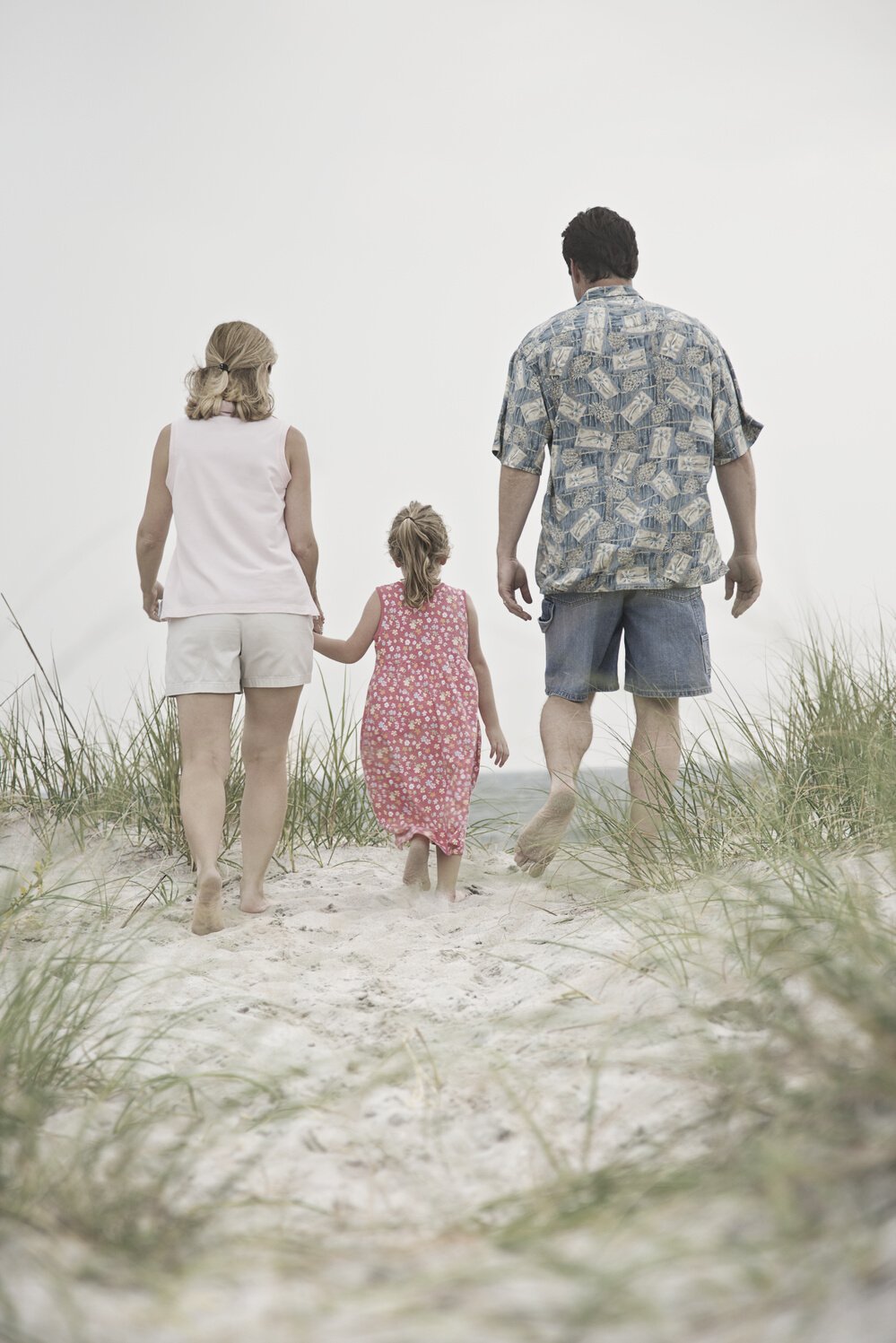 Family Walking toward Beach